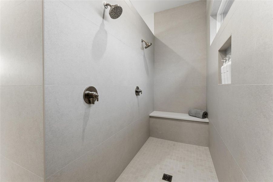 Bathroom with a tile shower