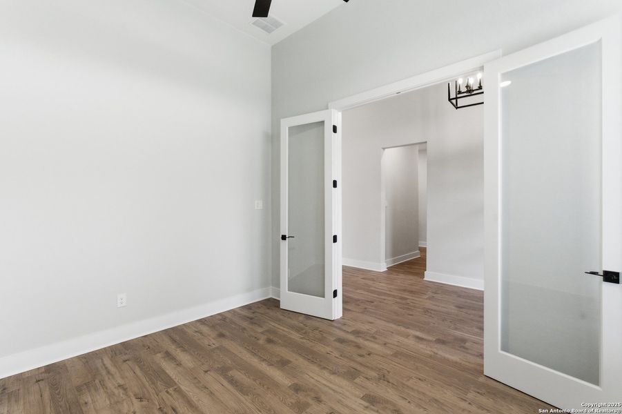 Spacious, unfurnished interior of a new home in Potranco Oaks, Castroville (Image 45).