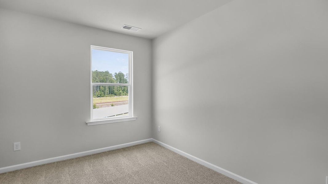 Spacious, unfurnished interior of a new home in Townes at Seabrooke, Leland (Image 23).