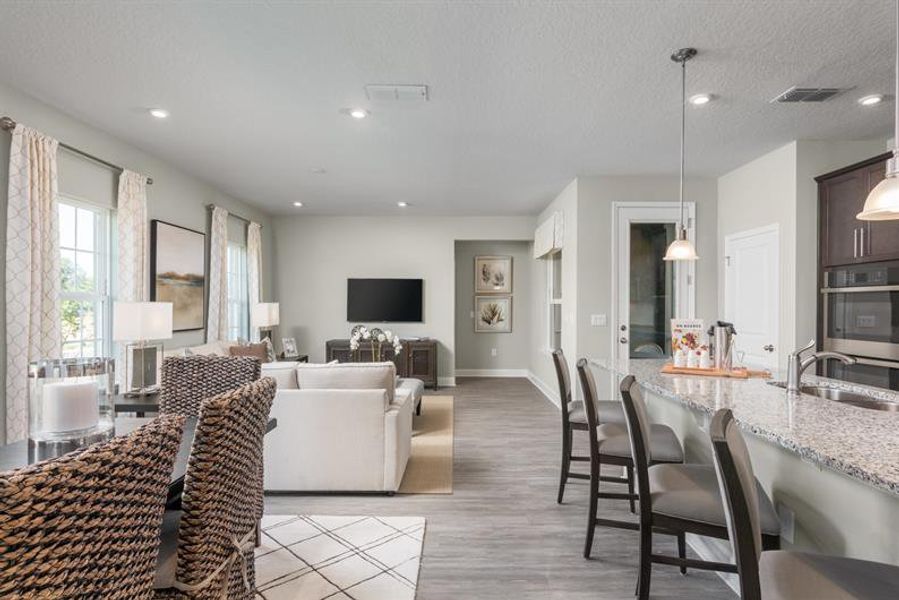 Representative furnished interior of a home built from the Hutchinson by Ryan Homes in Lake Mattie Preserve Single-Family, Auburndale (Image 7). Representative furnished interior of a home built from the Hutchinson by Ryan Homes in Lake Mattie Preserve Single-Family, Auburndale (Image 7).