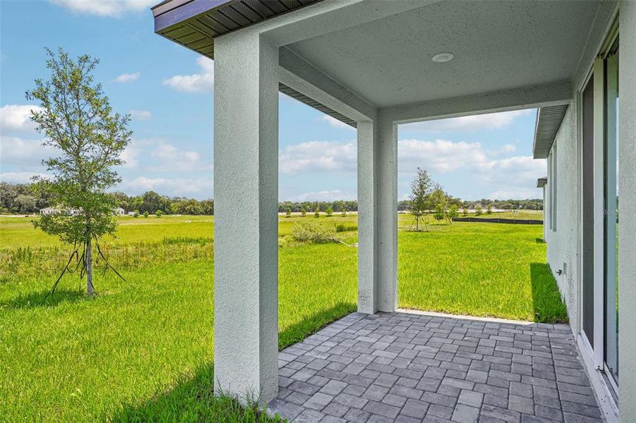 Exterior details and patio area of a home in The Reserve at Hammock Oaks - Classic Series, Lady Lake (Image 29). Exterior details and patio area of a home in The Reserve at Hammock Oaks - Classic Series, Lady Lake (Image 29).