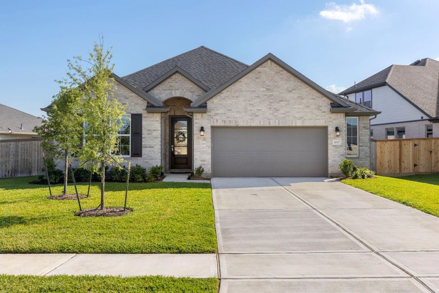 Front exterior of a home in the Mavera community, located in Conroe, TX (Image 9).