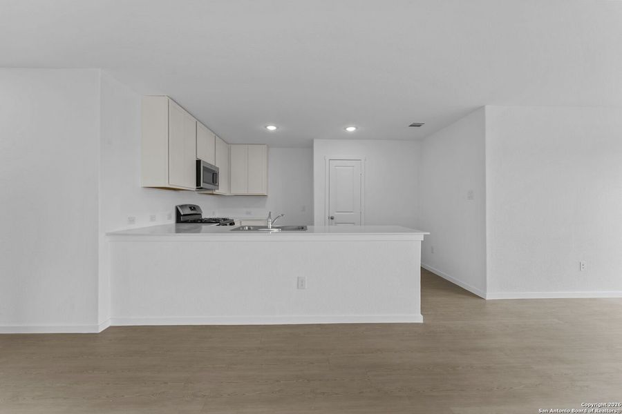 Furnished interior view inside a new home in Voss Farms, New Braunfels (Image 9).