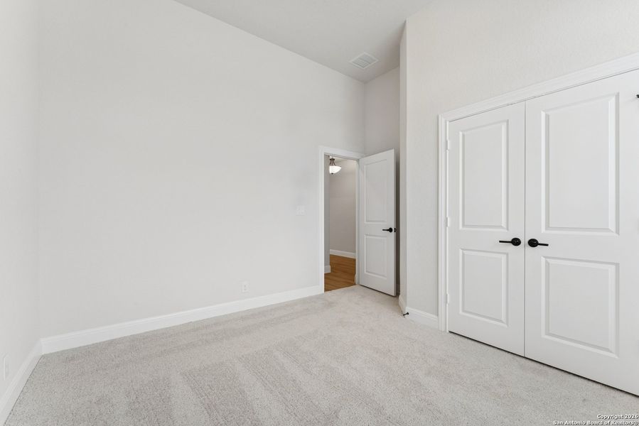 Spacious, unfurnished interior of a new home in Davis Ranch 50', San Antonio (Image 26).