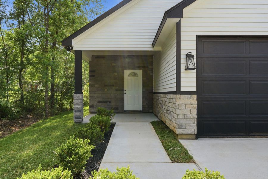 Exterior details and patio area of a home in , Willis (Image 25).