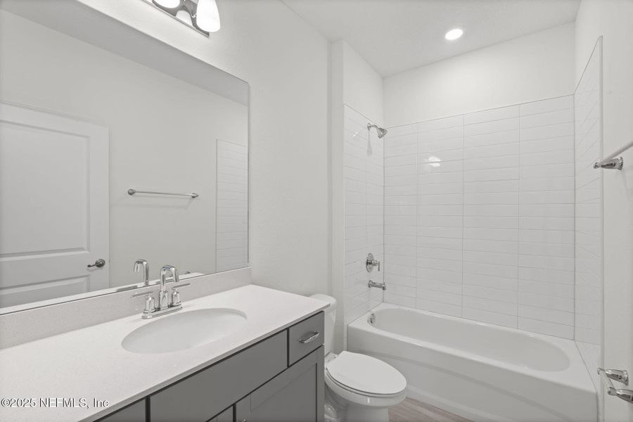 Furnished interior view inside a new home in Beacon Lake, St. Augustine (Image 9).