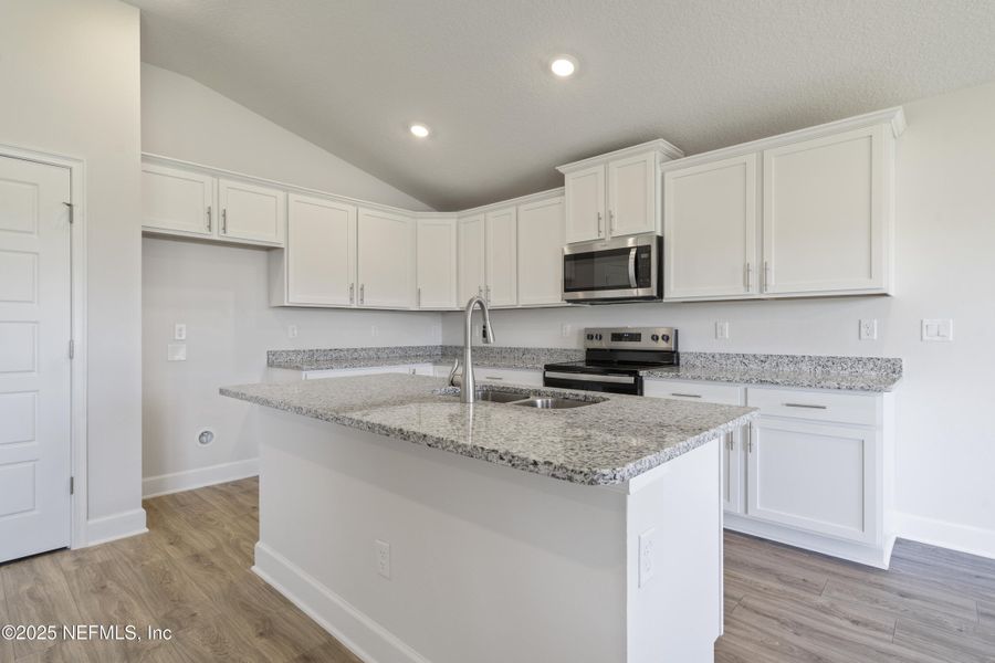 Furnished interior view inside a new home in Shadow Crest at Rolling Hills, Green Cove Springs (Image 6).