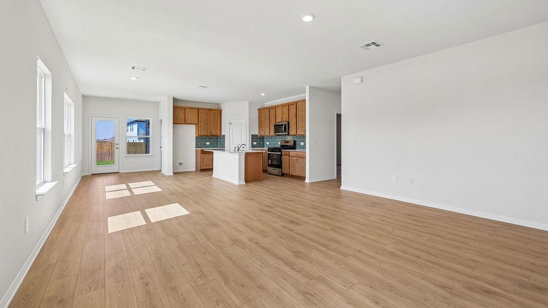 Spacious, unfurnished interior of a new home in Carillon, Manor (Image 11).