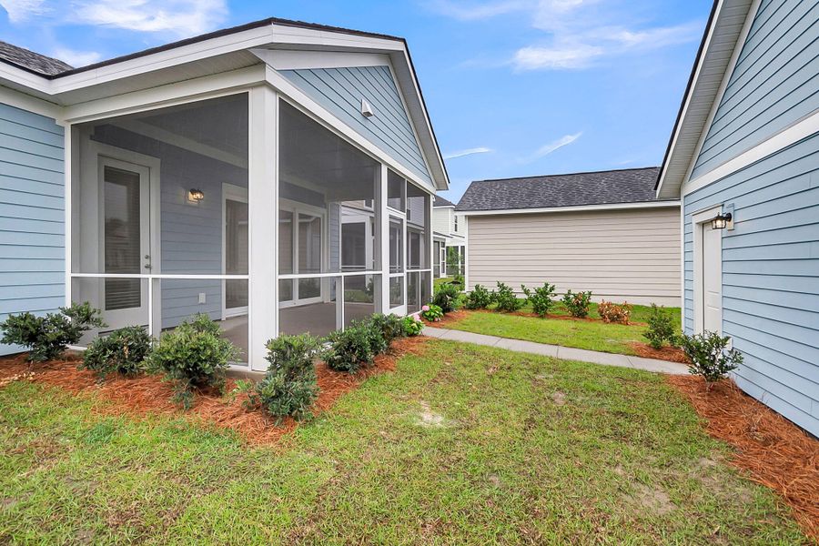 Exterior details and patio area of a home in Midtown at Nexton, Summerville (Image 3). Exterior details and patio area of a home in Midtown at Nexton, Summerville (Image 3).