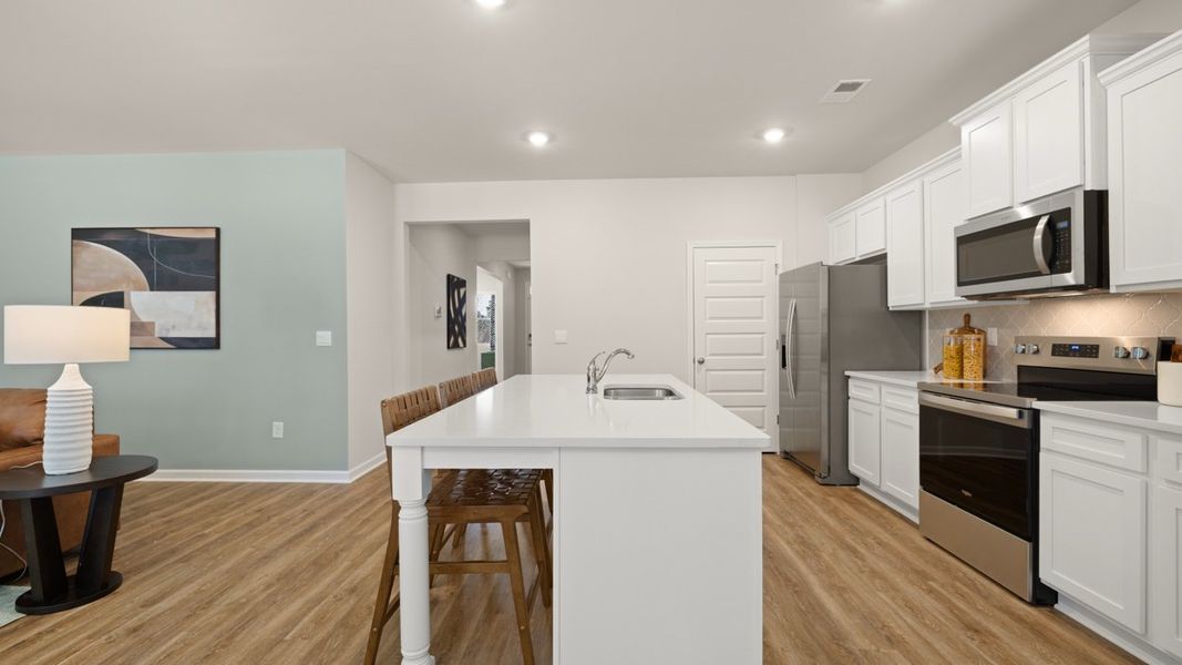 Representative furnished interior of a home built from the Aria by D.R. Horton in Newton Bridge Crossing, Athens (Image 9).