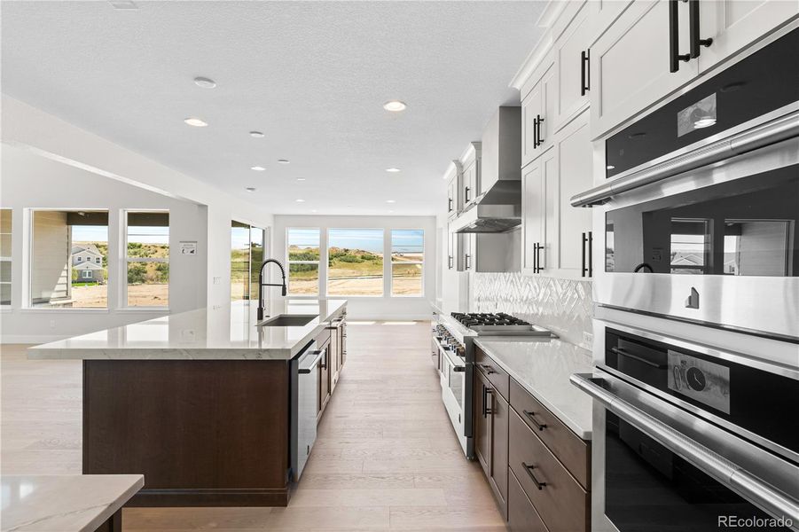 Furnished interior view inside a new home in Luxe at The Canyons, Castle Pines (Image 8).