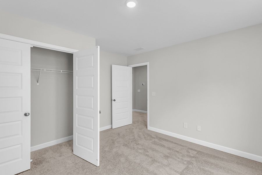 Spacious, unfurnished interior of a new home in Pineland Preserve, Summerville (Image 37).