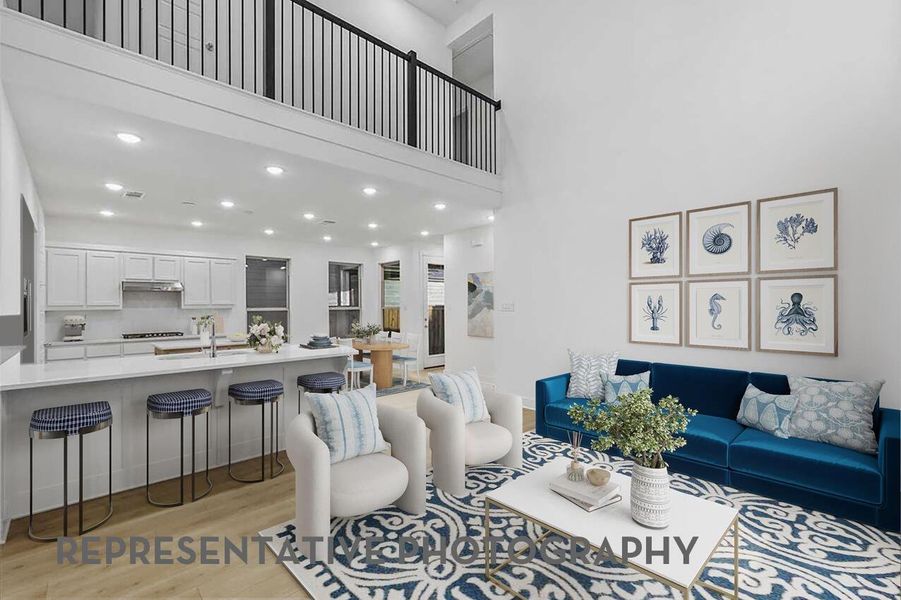 An open-concept kitchen flows seamlessly into the family room, creating a spacious and inviting area perfect for gathering and spending time together.