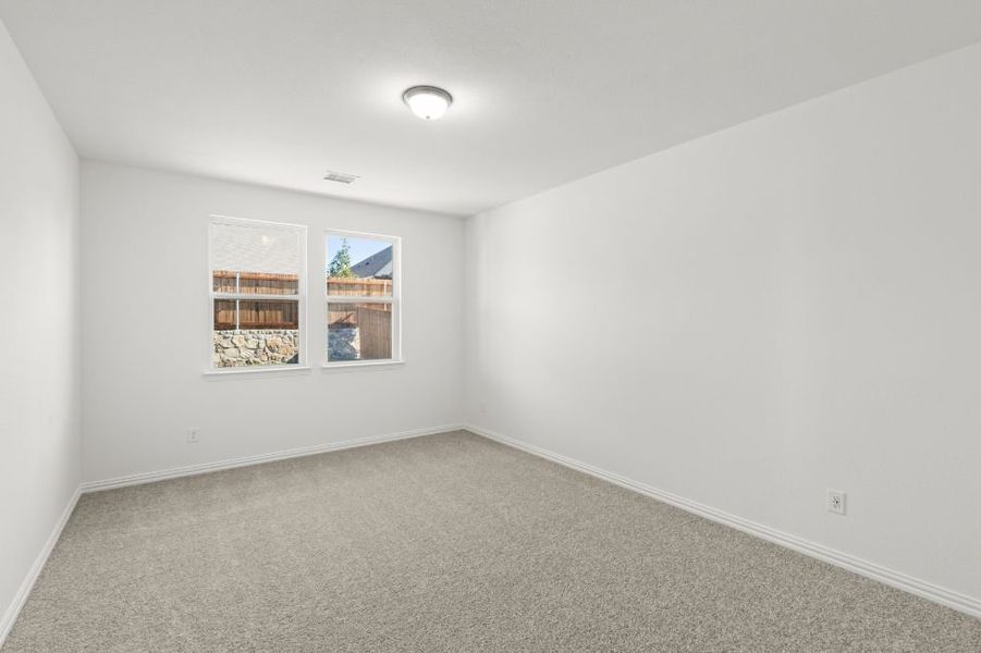 Representative unfurnished interior of a home built from the Lamar by UnionMain Homes in Reunion, Rhome (Image 29).