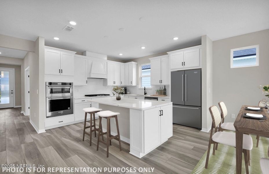 Furnished interior view inside a new home in Del Webb Wildlight, Yulee (Image 8).