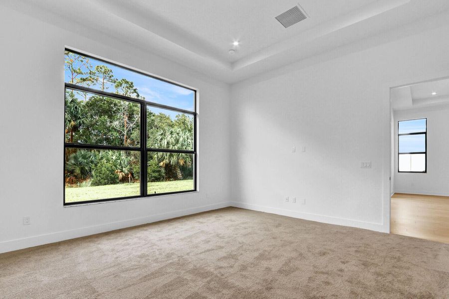 Spacious, unfurnished interior of a new home in Cove Royale, Stuart (Image 24).