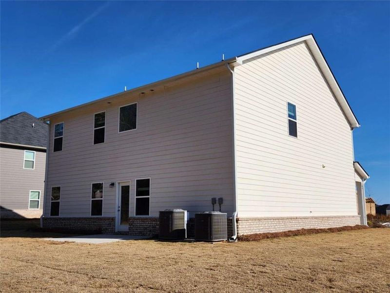 Exterior details and patio area of a home in Southern Hills, McDonough (Image 4).