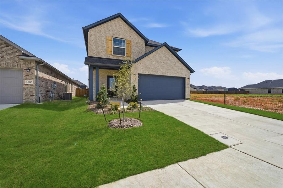Front exterior of a new home in Westridge, McKinney, TX, highlighting curb appeal (Image 1). Front exterior of a new home in Westridge, McKinney, TX, highlighting curb appeal (Image 1).