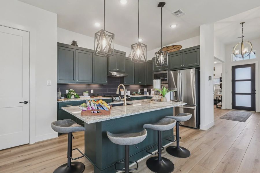 Representative furnished interior of a home built from the Oxford by Chesmar Homes in Bridgeland, Elgin (Image 4).