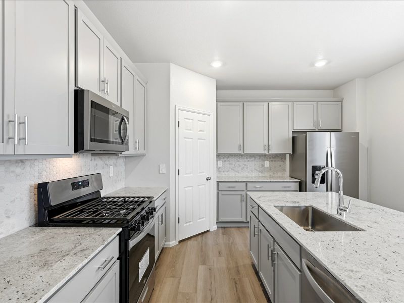 Furnished interior view inside a new home in Meridian Ranch, Peyton (Image 4).