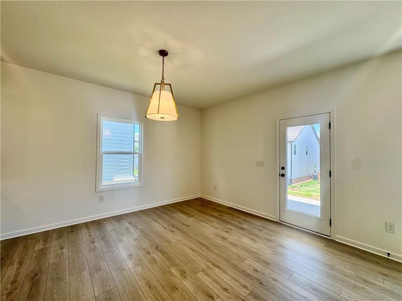 Spacious, unfurnished interior of a new home in Eastlyn Crossing, Flowery Branch (Image 29).