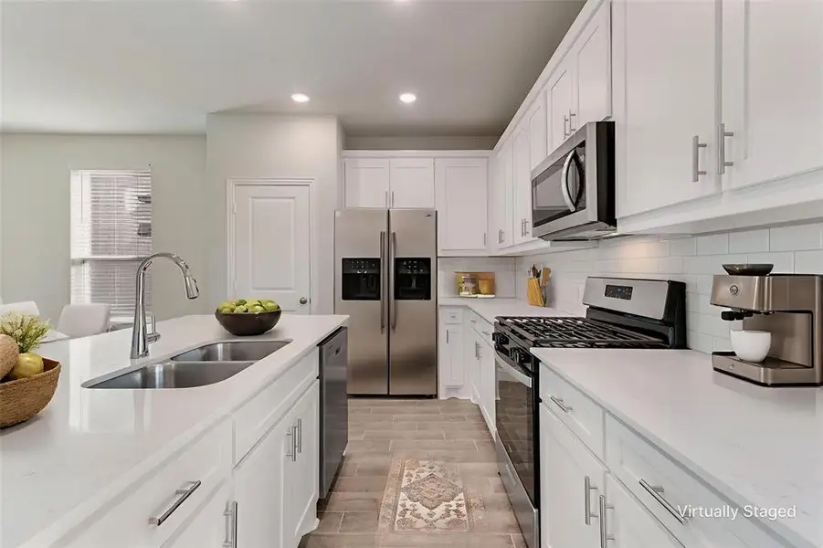 Furnished interior view inside a new home in AnaCapri, Anna (Image 6). Furnished interior view inside a new home in AnaCapri, Anna (Image 6).