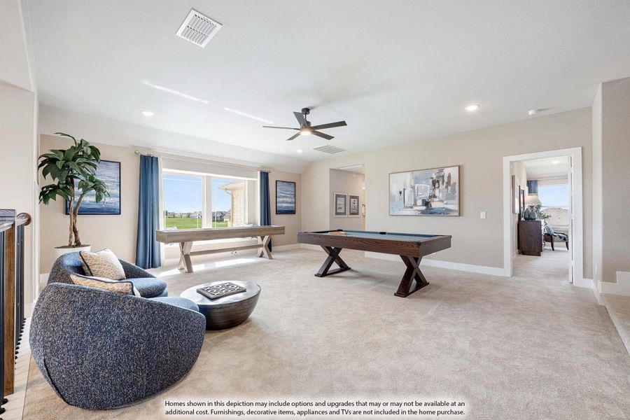 Spacious bonus room with pool table, seating area, ceiling fan, and carpet flooring