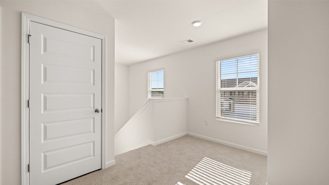 Representative unfurnished interior of a home built from the Belfort by D.R. Horton in Locust Grove Station - Cedar Ridge, Locust Grove (Image 20).