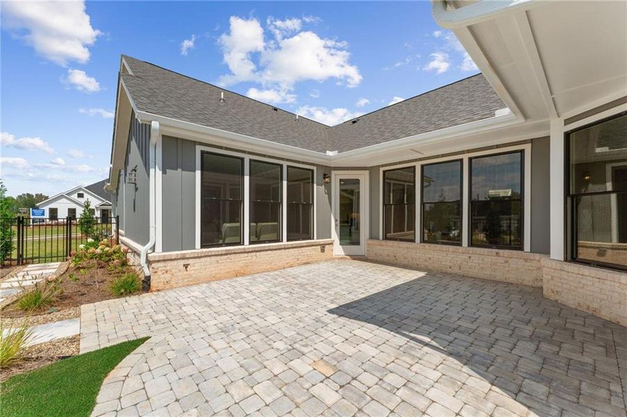 Front exterior of a new home in The Courtyards of Franklin Goldmine, Cumming, GA, highlighting curb appeal (Image 19).