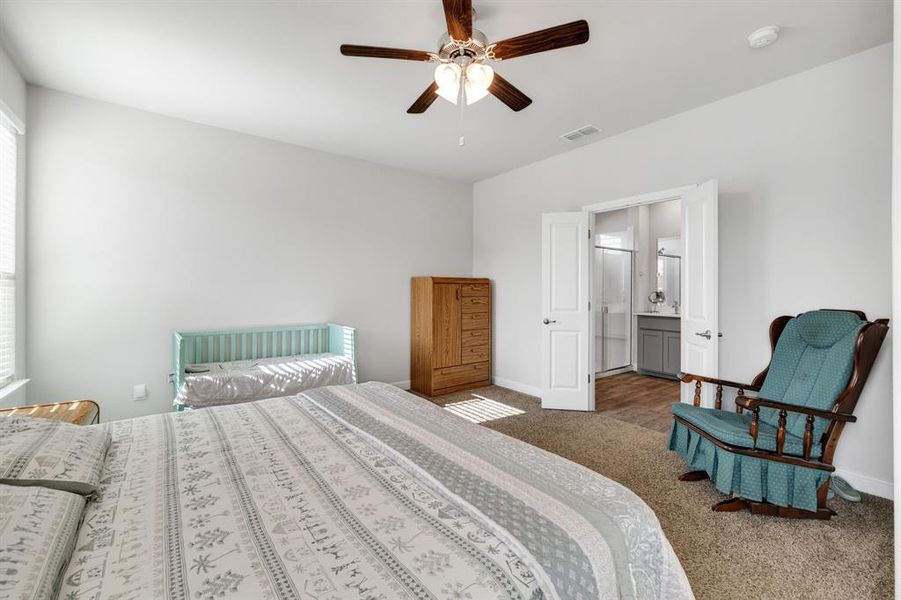Bedroom with carpet floors and ceiling fan