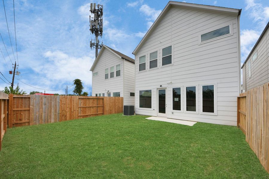 Front exterior of a new home in Agua, Houston, TX, highlighting curb appeal (Image 18). Front exterior of a new home in Agua, Houston, TX, highlighting curb appeal (Image 18).