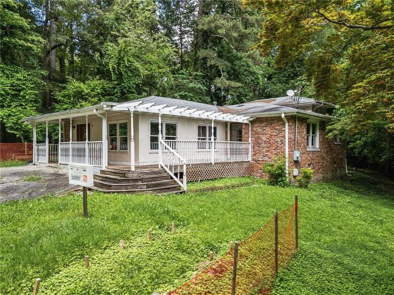 Front exterior of a new home in , Alpharetta, GA, highlighting curb appeal (Image 1).