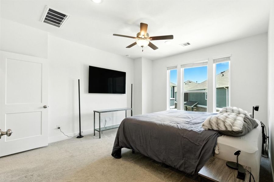 Step into the sanctuary of theprimary bedroom. Soft carpetingunderfoot adds a touch of luxury,creating a warm and invitingatmosphere that extends throughoutthe space. Step into the sanctuary of theprimary bedroom. Soft carpetingunderfoot adds a touch of luxury,creating a warm and invitingatmosphere that extends throughoutthe space.