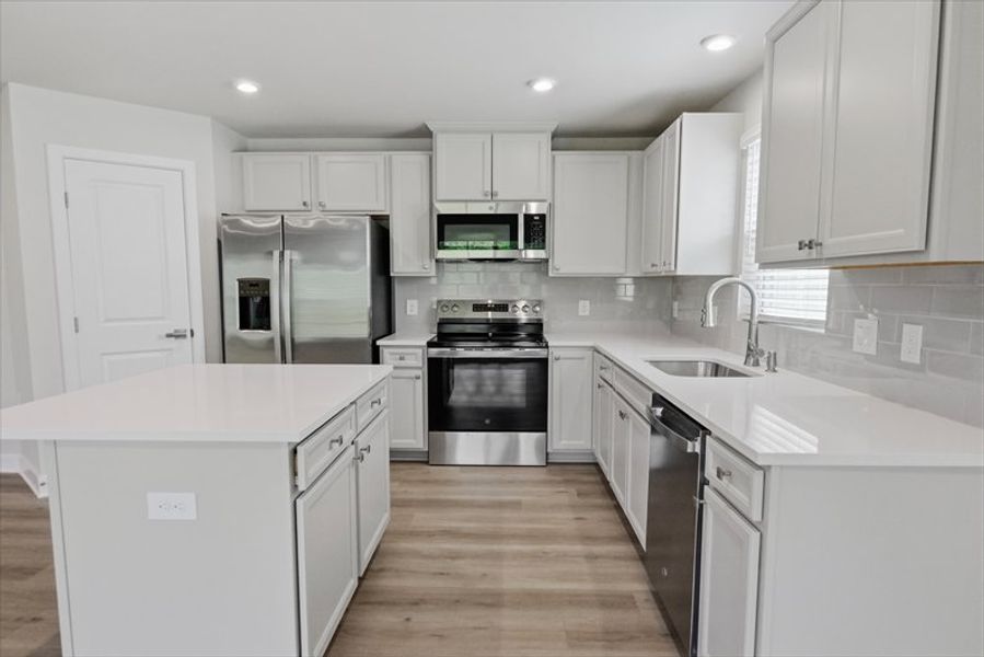 Furnished interior view inside a new home in Wren Woods Ranches, Gray Court (Image 5).