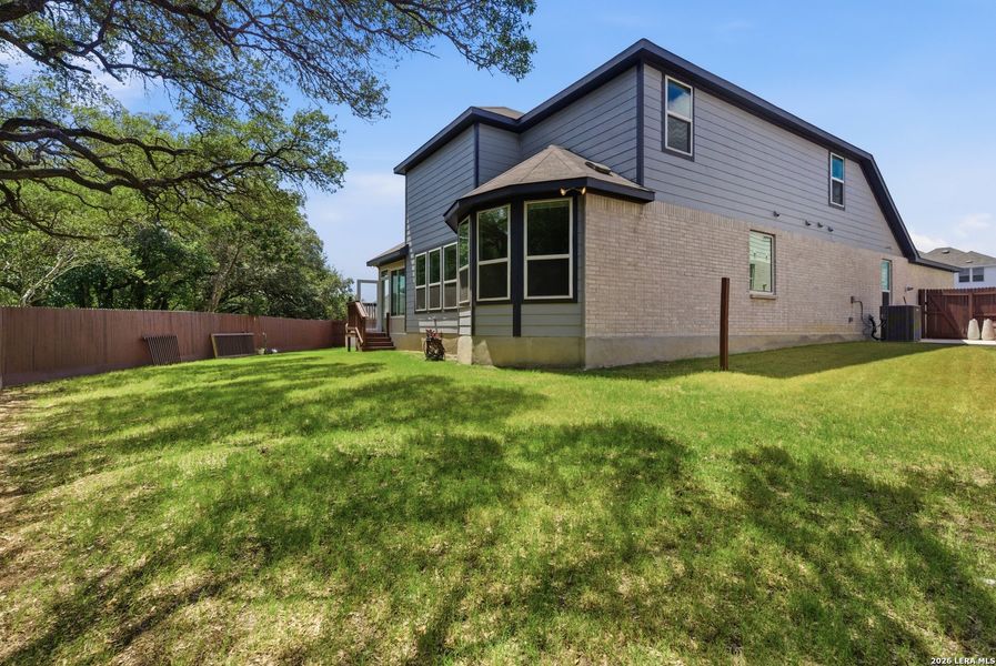Exterior details and patio area of a home in Davis Ranch, San Antonio (Image 4).