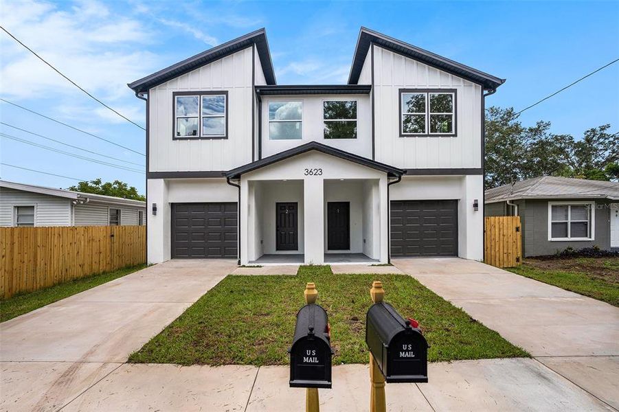 Front exterior of a new home in , Tampa, FL, highlighting curb appeal (Image 1).