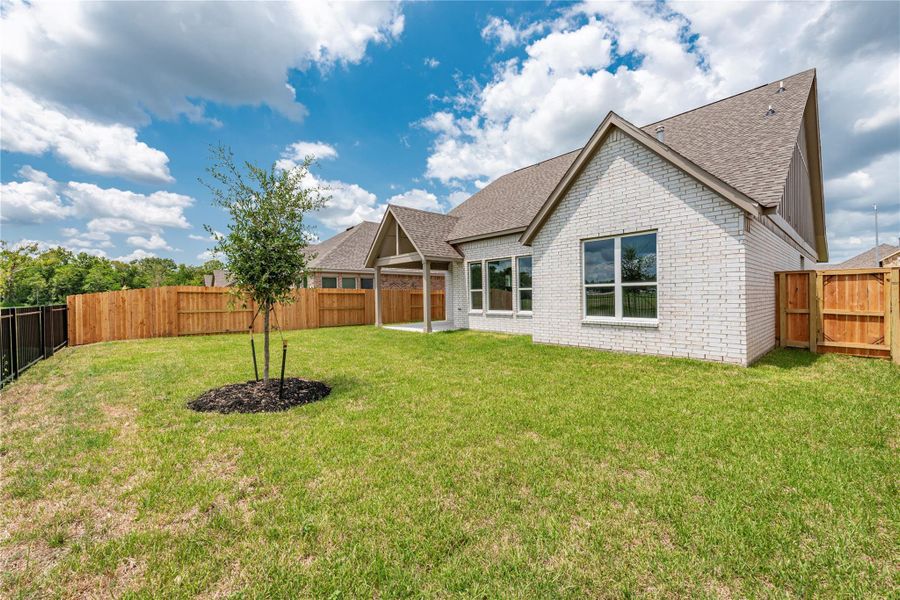 Front exterior of a new home in , Santa Fe, TX, highlighting curb appeal (Image 19). Front exterior of a new home in , Santa Fe, TX, highlighting curb appeal (Image 19).