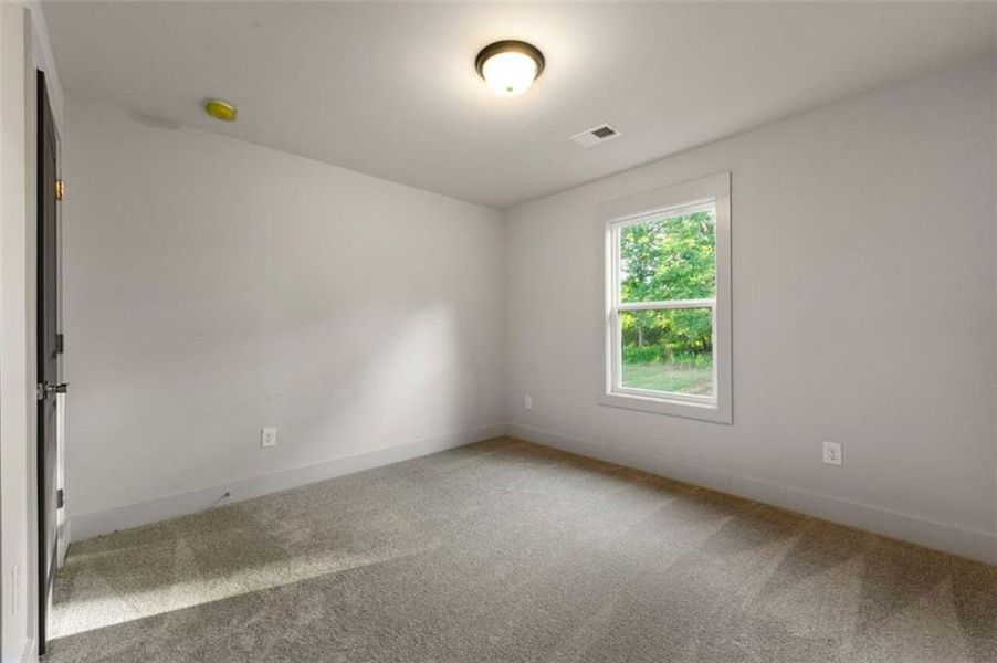 Spacious, unfurnished interior of a new home in Steeplechase, Hoschton (Image 32).