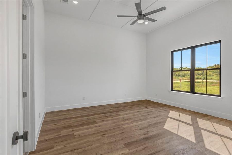 Spare room featuring light wood finished floors, recessed lighting, and ceiling fan