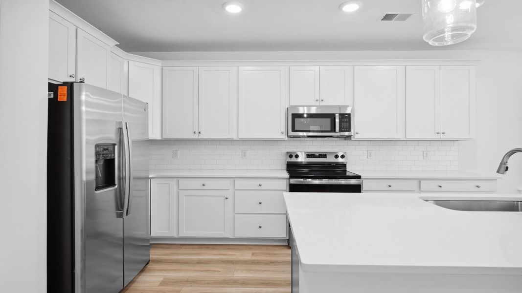 Furnished interior view inside a new home in Creekside at Andrews, Summerville (Image 11).