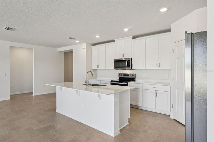 Furnished interior view inside a new home in Bradbury Creek - Signature Series, Haines City (Image 9).