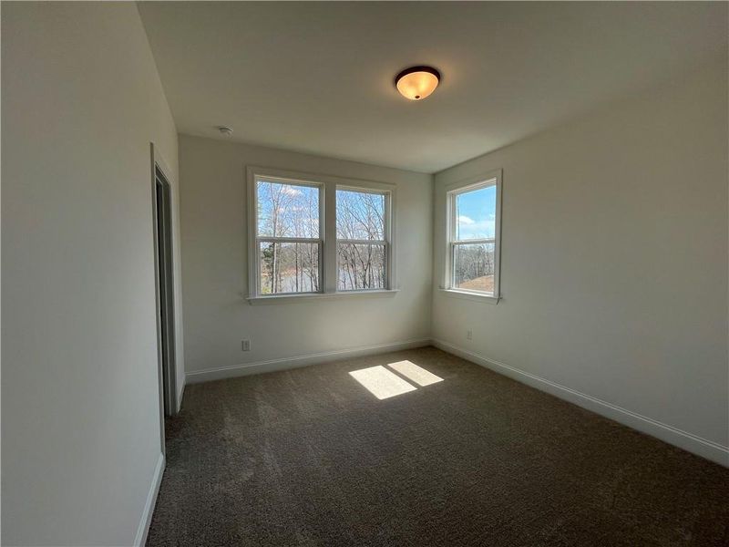 Spacious, unfurnished interior of a new home in East Harbor II at Chestatee, Dawsonville (Image 25).