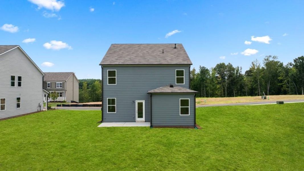 Front exterior of a new home in Sheffield Highlands, Dallas, GA, highlighting curb appeal (Image 29). Front exterior of a new home in Sheffield Highlands, Dallas, GA, highlighting curb appeal (Image 29).