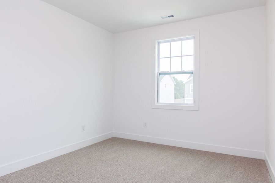 Spacious, unfurnished interior of a new home in High Grove Oaks, Fuquay Varina (Image 28).