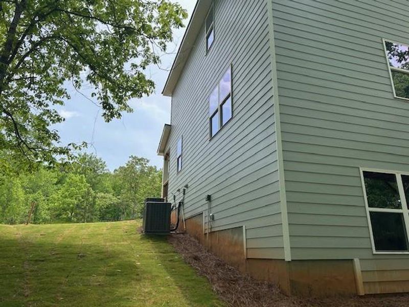 Exterior details and patio area of a home in Habersham Meadows, Demorest (Image 18).