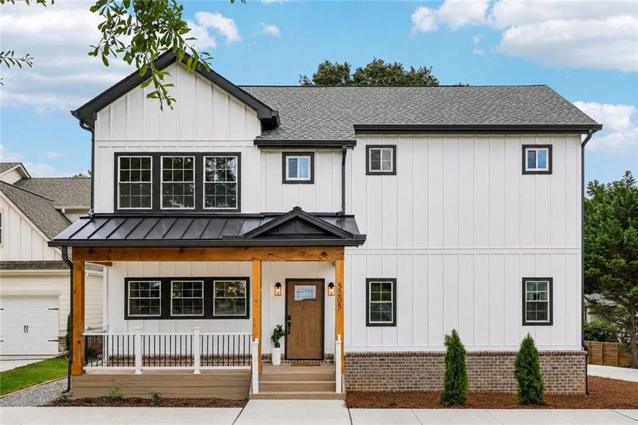 Front exterior of a new home in , Flowery Branch, GA, highlighting curb appeal (Image 1). Front exterior of a new home in , Flowery Branch, GA, highlighting curb appeal (Image 1).