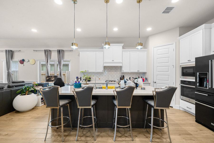 Furnished interior view inside a new home in Marvida, Cypress (Image 16).