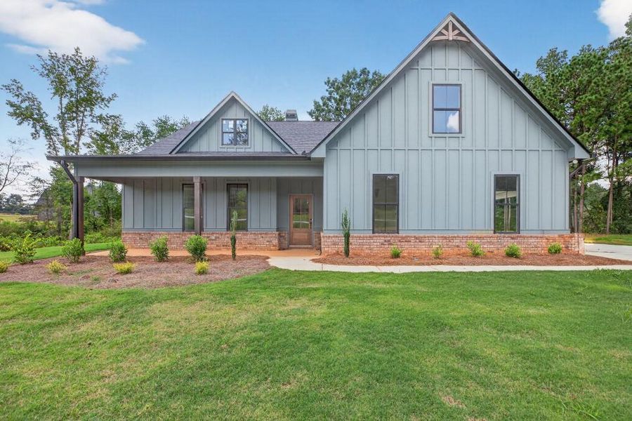 Front exterior of a new home in , Dallas, GA, highlighting curb appeal (Image 24).