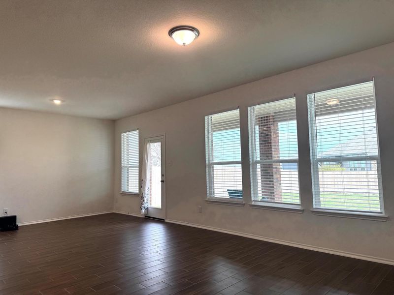 Lot of windows for the family room connecting with dinning room, lot of natural light. Great place for family gathering