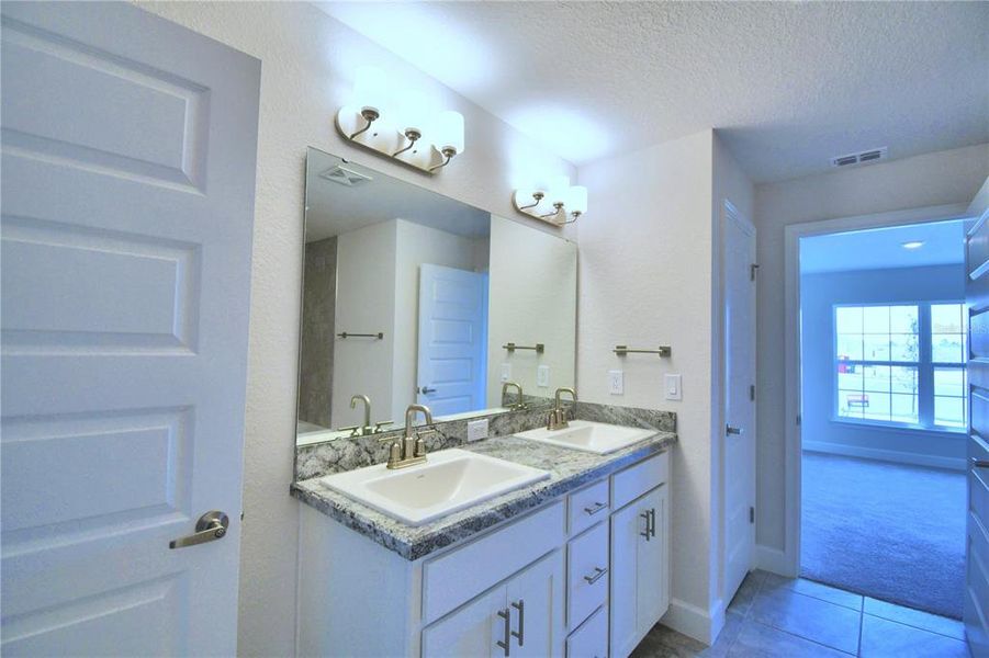 Furnished interior view inside a new home in Cadence Crossing, Auburndale (Image 10).
